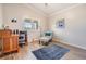 Inviting office with wood floors, natural light, and functional workspace at 10232 Buncombe Way, San Antonio, FL 33576