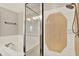 Bathroom featuring soaking tub and shower with a glass door at 10314 Deepbrook Dr, Riverview, FL 33569