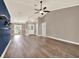 Spacious open concept living room featuring hardwood floors and entry at 10314 Deepbrook Dr, Riverview, FL 33569