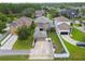 Home with a detached garage, fenced yard, and spacious driveway at 10422 Fenceline Rd, New Port Richey, FL 34655