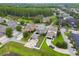 The property features a spacious backyard, green lawn, and mature landscaping at 10422 Fenceline Rd, New Port Richey, FL 34655