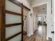 Entryway view featuring a sliding barn door and views into the breakfast nook at 10422 Fenceline Rd, New Port Richey, FL 34655