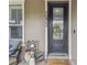 Inviting front door with visible house number and stylish decor elements at 10422 Fenceline Rd, New Port Richey, FL 34655