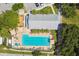 Aerial view of the community pool and clubhouse at 10422 Fenceline Rd, New Port Richey, FL 34655