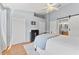 Spacious main bedroom with a ceiling fan, closet and connected main bath at 1044 Kennewick Ct, Wesley Chapel, FL 33543