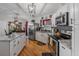 Modern kitchen with granite countertops, stainless steel appliances, and hardwood floors offering ample space at 11226 Murraysville Dr, Spring Hill, FL 34609