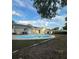 Spacious backyard with a large swimming pool and lush green grass at 1215 Windsor Cir, Brandon, FL 33510