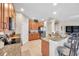 Bright kitchen features stainless steel appliances, granite counters, and plenty of cabinet space at 1328 Rushgrove Cir, Dover, FL 33527