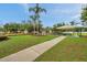 Community playground with picnic tables and benches near the playground at 1328 Rushgrove Cir, Dover, FL 33527