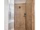 Walk-in shower stall has a glass door and is lined with tile at 1328 Rushgrove Cir, Dover, FL 33527