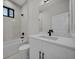 Stylish bathroom with a tub, contemporary fixtures, and a sleek design at 14009 Wenzel Ave, Port Charlotte, FL 33981