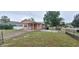 Cozy single-Gathering home featuring a covered carport and fenced yard at 1401 43Rd S St, St Petersburg, FL 33711