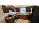 Modern kitchen featuring ample cabinet space, tiled floors, and countertops at 1401 43Rd S St, St Petersburg, FL 33711