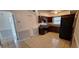 Efficient kitchen equipped with stainless steel appliances and tile flooring at 1401 43Rd S St, St Petersburg, FL 33711