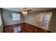 Inviting living room boasts hardwood floors and a classic ceiling fan at 1401 43Rd S St, St Petersburg, FL 33711