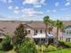 Aerial view of a beautiful single-Gathering home with palm trees and manicured landscaping at 14110 Barrington Stowers Dr, Lithia, FL 33547