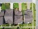 Bird's eye view of homes with well manicured lawns and driveways in a suburban setting at 14110 Barrington Stowers Dr, Lithia, FL 33547