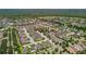 High-altitude view of a well-planned residential community with green spaces and tree coverage at 14110 Barrington Stowers Dr, Lithia, FL 33547