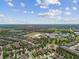 Overhead view showing houses, community amenities, and school facilities in the surrounding area at 14110 Barrington Stowers Dr, Lithia, FL 33547