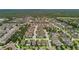 An aerial view of a neighborhood featuring well-maintained homes and lush greenery at 14110 Barrington Stowers Dr, Lithia, FL 33547