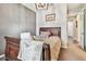 Charming bedroom features a decorative wooden bed frame and soft, neutral tones at 14110 Barrington Stowers Dr, Lithia, FL 33547