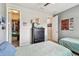 Bedroom featuring neutral walls, a bed, a closet, and a window at 14110 Barrington Stowers Dr, Lithia, FL 33547