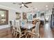 Dining room with hardwood floors and a clear view of the stylish kitchen at 14110 Barrington Stowers Dr, Lithia, FL 33547