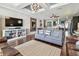 Spacious living area with an entertainment center and open access to other living areas at 14110 Barrington Stowers Dr, Lithia, FL 33547