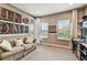 Inviting living room with neutral walls, comfortable couch, and artistic wall decor at 14110 Barrington Stowers Dr, Lithia, FL 33547