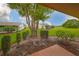 Beautiful backyard with lush green grass, mature trees, and well-maintained landscaping at 1508 Ingram Dr # 20, Sun City Center, FL 33573