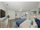 Bedroom featuring wood floors, neutral walls, a ceiling fan and two large closets at 1508 Ingram Dr # 20, Sun City Center, FL 33573