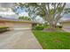 Charming single-story home with a two-car garage and a beautifully landscaped front yard at 1508 Ingram Dr # 20, Sun City Center, FL 33573