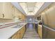 Functional kitchen with ample cabinet space, stainless steel appliances, and a bright, airy atmosphere at 1508 Ingram Dr # 20, Sun City Center, FL 33573
