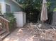 Brick patio with an outdoor dining set and plenty of shade at 1525 38Th N Ave, St Petersburg, FL 33704