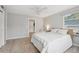 Inviting main bedroom with a queen-sized bed, soft rug, and modern decor at 1525 38Th N Ave, St Petersburg, FL 33704