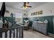 Charming Bedroom featuring a crib, changing table, and decorative accents, creating a cozy space at 15430 Caravan Ave, Odessa, FL 33556
