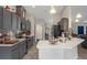 Well-appointed kitchen with modern appliances, white countertops, and stylish cabinetry, creating a functional and inviting space at 16473 Scaup Duck Ave, Weeki Wachee, FL 34614
