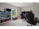 Bright office space with a view and ample room for multiple computer screens and gaming setup at 16473 Scaup Duck Ave, Weeki Wachee, FL 34614