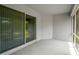 Spacious screened-in patio featuring a sliding glass door to the outside at 16473 Scaup Duck Ave, Weeki Wachee, FL 34614