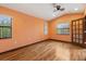 Bedroom features hardwood floors and natural lighting at 1721 Allens Creek Dr, Clearwater, FL 33764