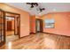 Bedroom with hardwood floors, closet, and natural light at 1721 Allens Creek Dr, Clearwater, FL 33764