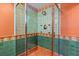 Walk-in shower featuring unique tile work at 1721 Allens Creek Dr, Clearwater, FL 33764