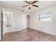 Bedroom with closet and a window at 1839 Neptune Dr, Englewood, FL 34223