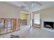 Spacious living room featuring a brick fireplace, open layout, and natural light, ready for renovation at 1897 Dolphin S Blvd, St Petersburg, FL 33707