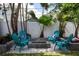Backyard fire pit area with Adirondack chairs, perfect for outdoor gatherings at 1915 10Th N St, St Petersburg, FL 33704