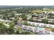 An aerial view showcasing the community's layout, with verdant trees surrounding well-maintained buildings at 2060 Marilyn St # 114, Clearwater, FL 33765