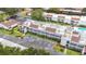 Aerial view of condo buildings featuring parking, landscaping, a pool, and other amenities at 2060 Marilyn St # 114, Clearwater, FL 33765