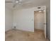 Neutral bedroom with standard closet, door, white ceiling fan and beige carpet at 210 Martha Ln # 210, Oldsmar, FL 34677