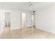 This spacious bedroom has tile floors and has an adjacent bathroom and walk-in closet at 241 Skiff Pt # 1, Clearwater Beach, FL 33767