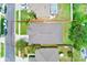 An aerial view of a house with a fenced yard, complemented by a pool and surrounding neighborhood at 25729 Aldus Dr, Land O Lakes, FL 34639
